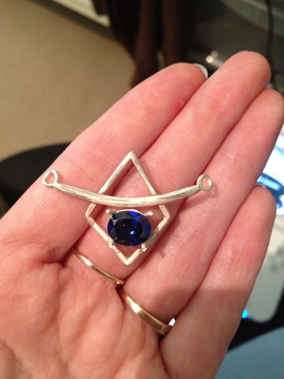 Add your links (made with 0.8mm round wire) solder them with easy solder. Then file and buff to tidy. I also bent them backwards slightly to add to the design.