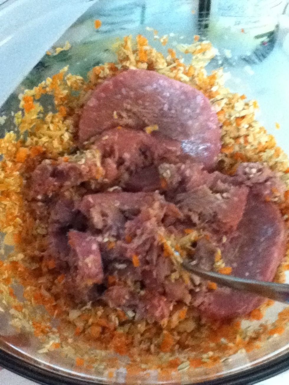 Add your meat-break it up with your fork.