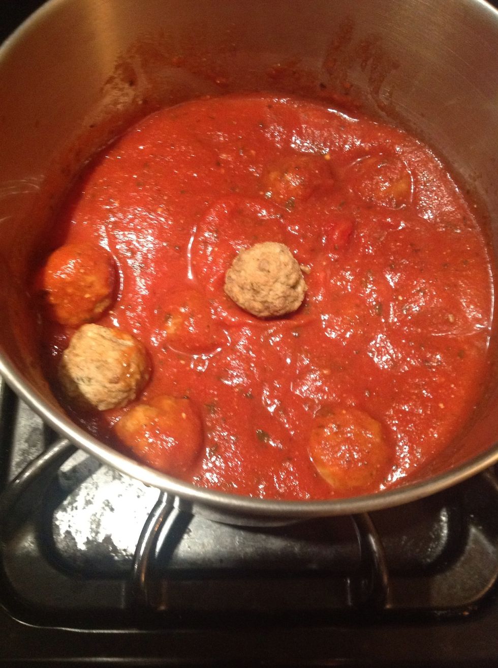 Add your meatballs to the pasta sauce to heat up for 10 mins.