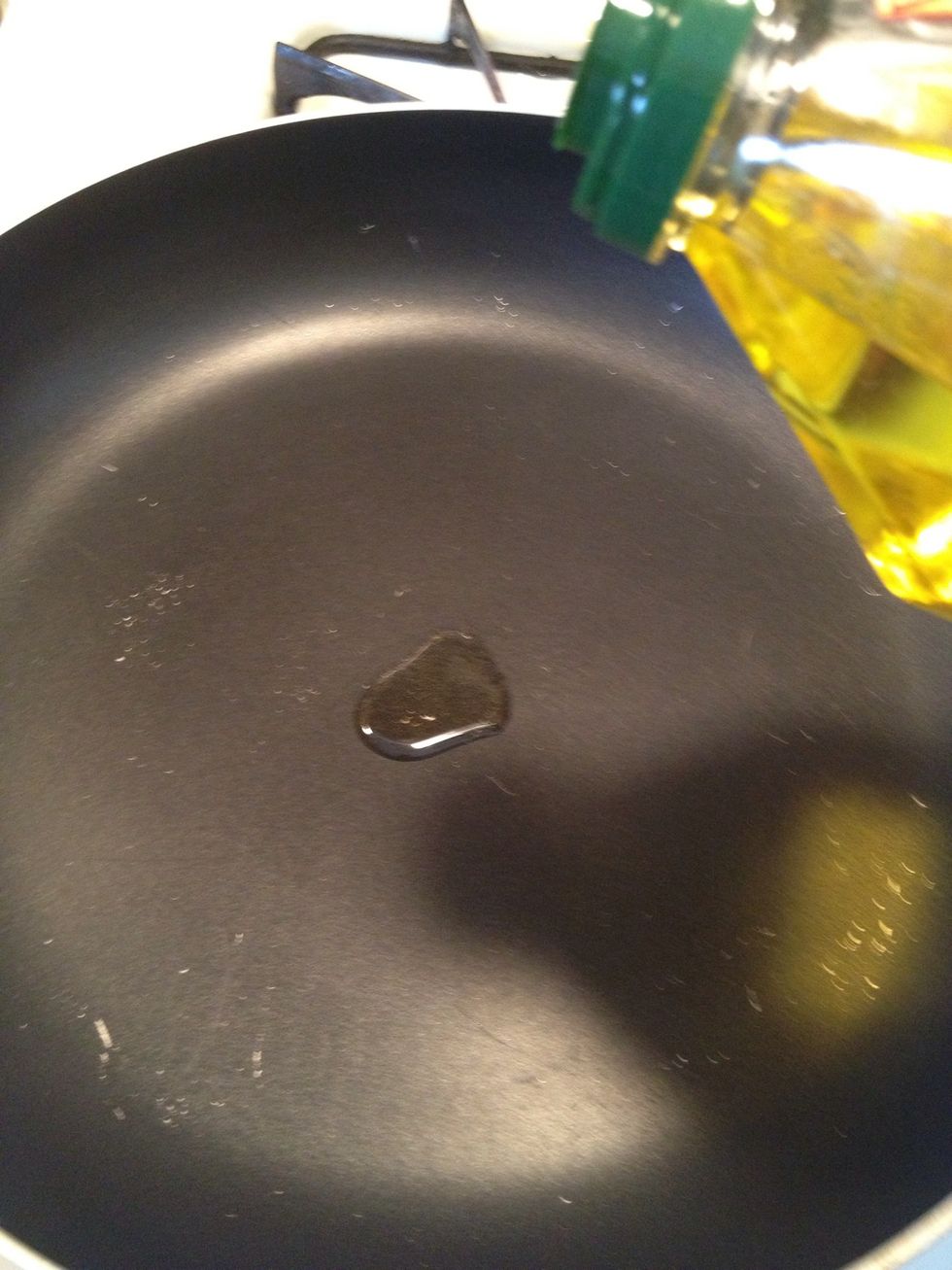 Add your oil to a pan over medium heat.
