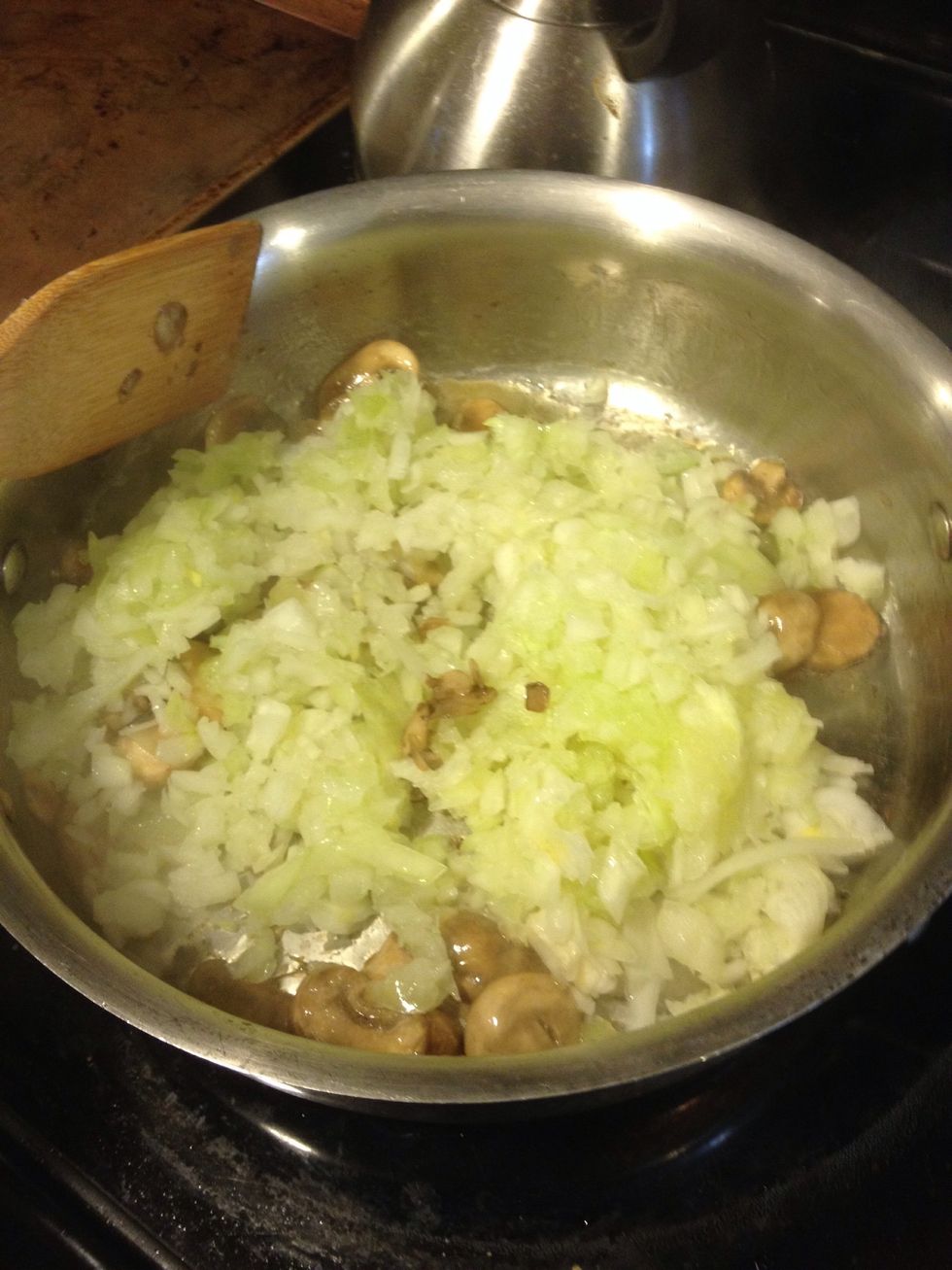 Add your onions. I like to chop mine instead of adding big slices, but you can do it that way if you like. You're going to cook these until they are tender, but not browned.