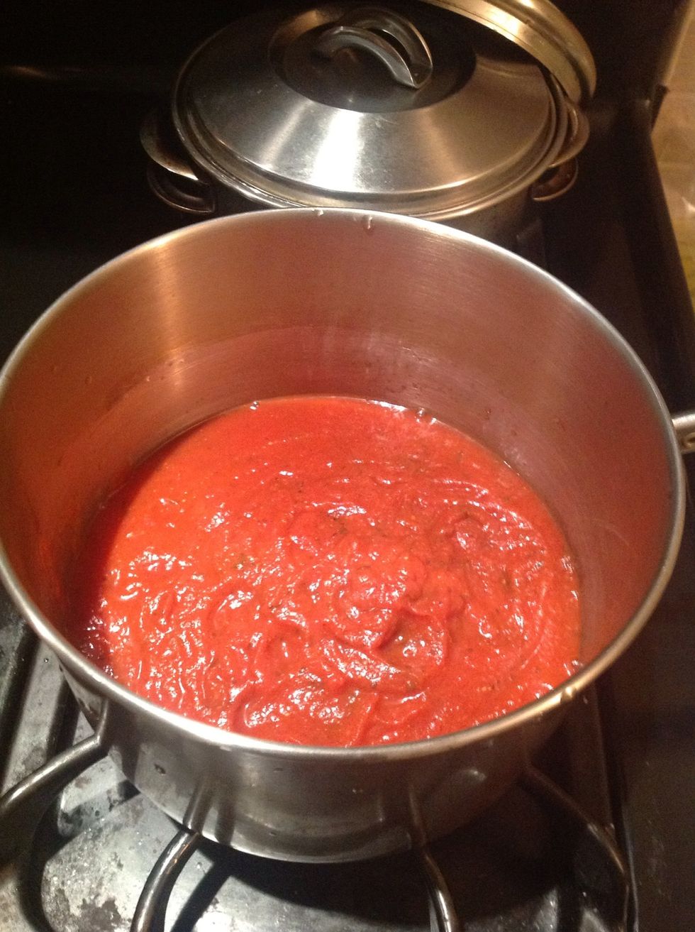 Add your pasta sauce to another pot over medium heat.
