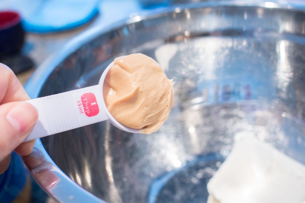 Add your peanut butter to the shortening.