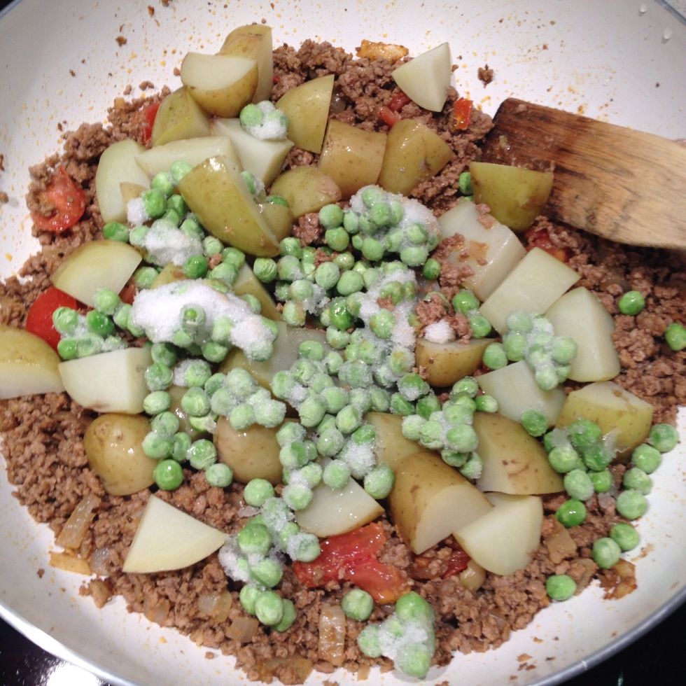 Add your peas and potatoes and cook on a low to medium heat for 20 minutes, adding water occasionally