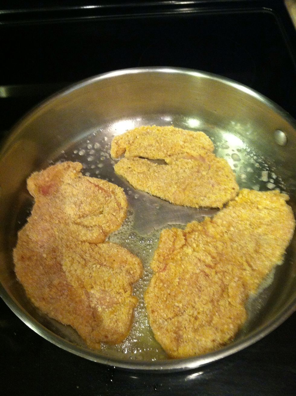 Add your pieces of meat. Depends on the thickness of your breast cook your chicken. Mine took about 3 mins on the 1st side. Turn over