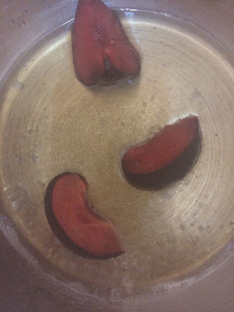 Add your plums and keep the flame low