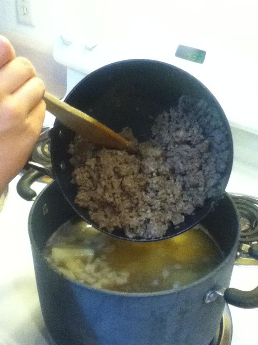 Add your pork sausage to the soup pot.