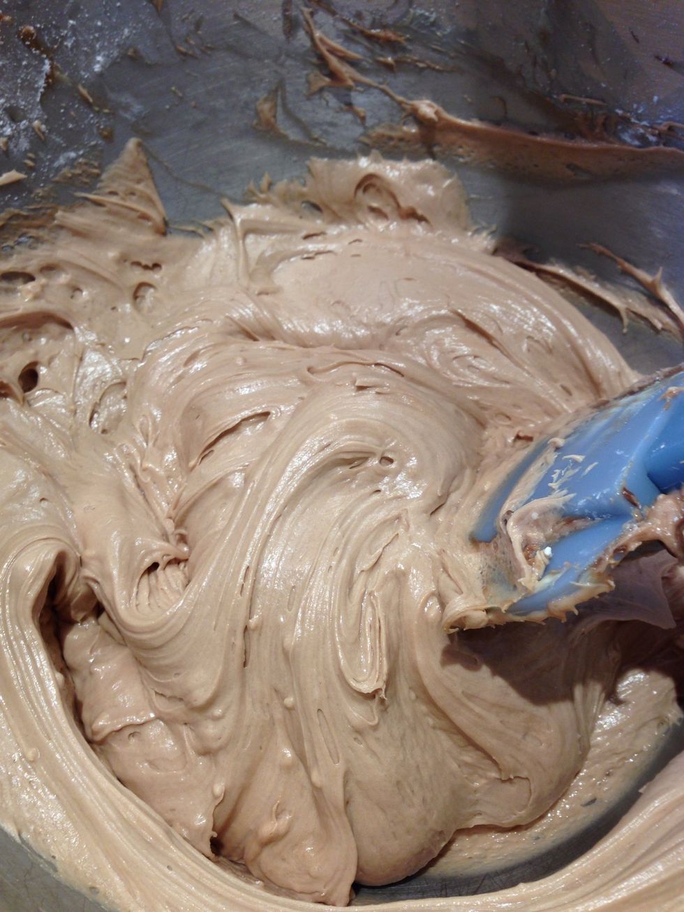Add your powdered sugar cup by cup, and vanilla extract. Whip it well! Then throw it in the fridge for about an hour, just so it hardens up a little bit!
