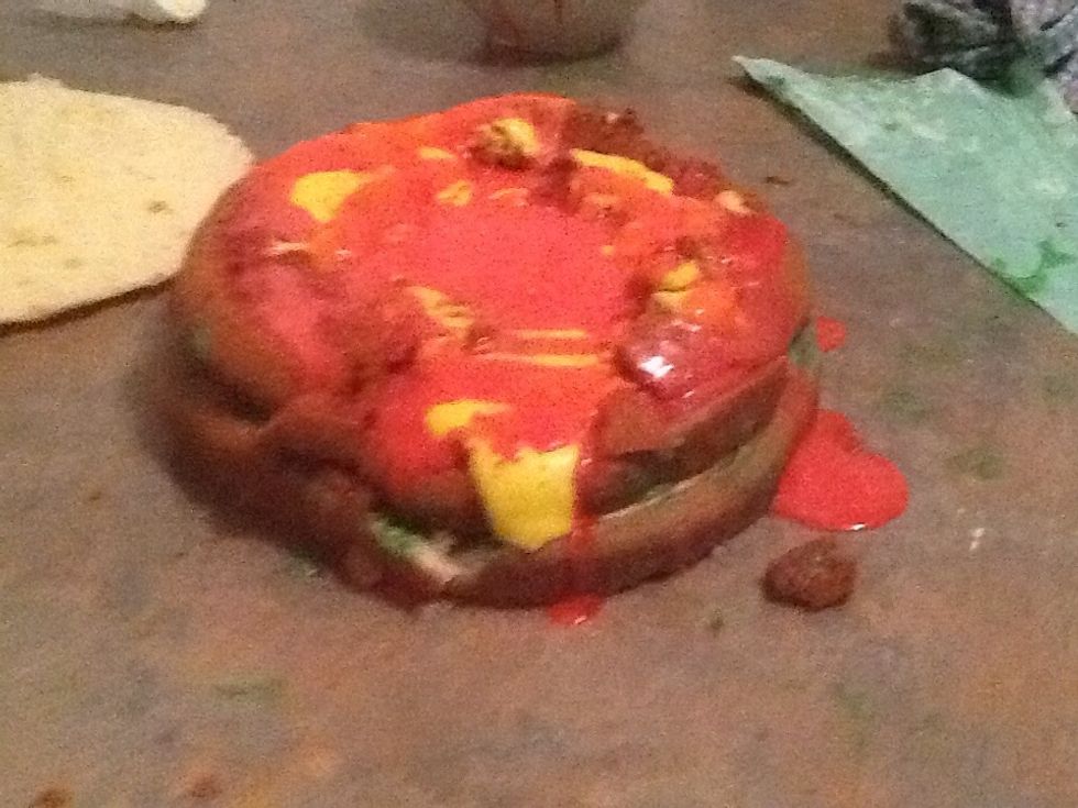 Add your red food colouring for the sauce