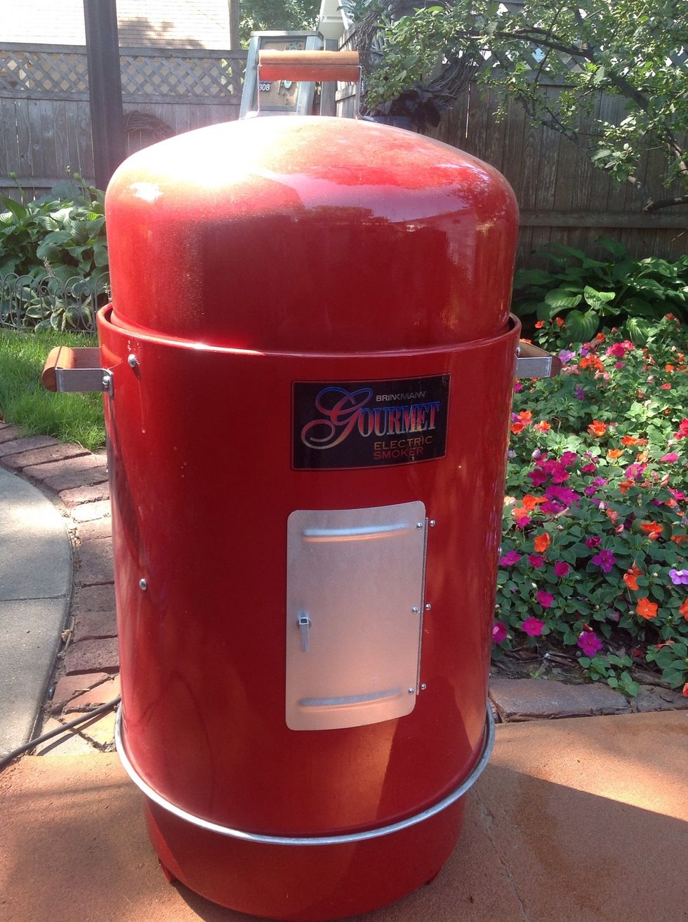 Add your ribs and patiently wait. These two racks will take about 4 hours.