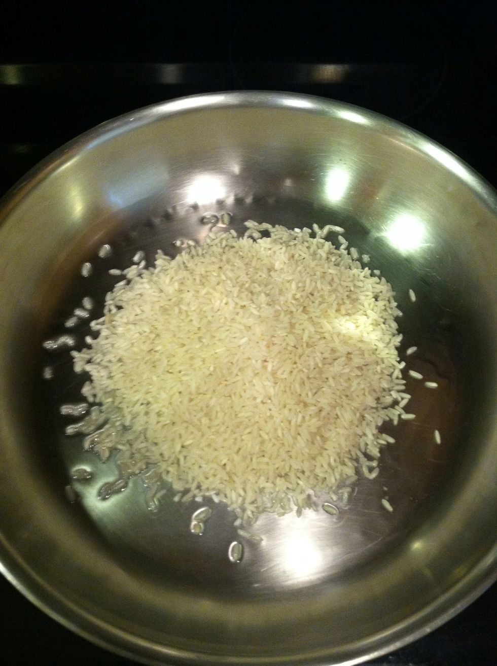 Add your rice, and saut\u00e9 a few minutes.