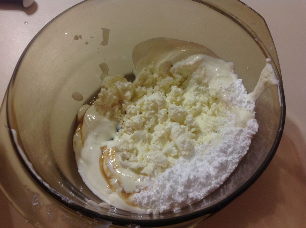 Add your ricotta, yoghurt, icing sugar, and vanilla essence in a bowl.