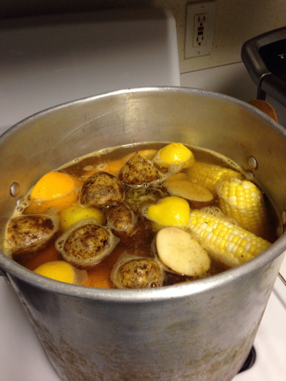 Add your sausage , Bring to a boil until corn and potatoes are almost cooked