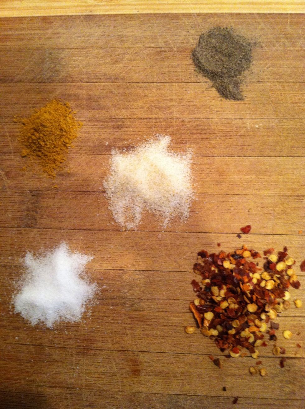 Add your spices! (Curry powder, salt, pepper, crushed red pepper, and garlic powder)