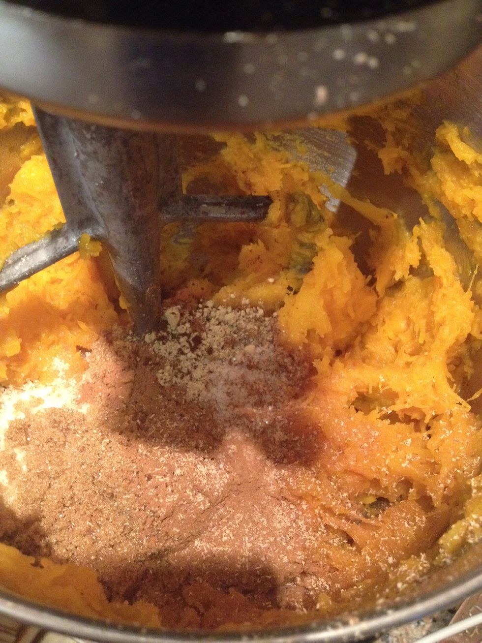 Add your spices in, your cinnamon, ginger, cloves, and nutmeg, and some salt.