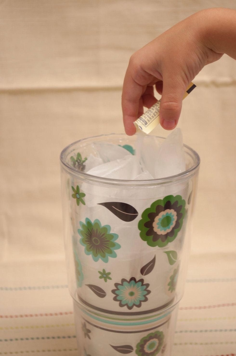 Add your Splenda to your cup full of ice. I use one packet, but you can use as many as you like.