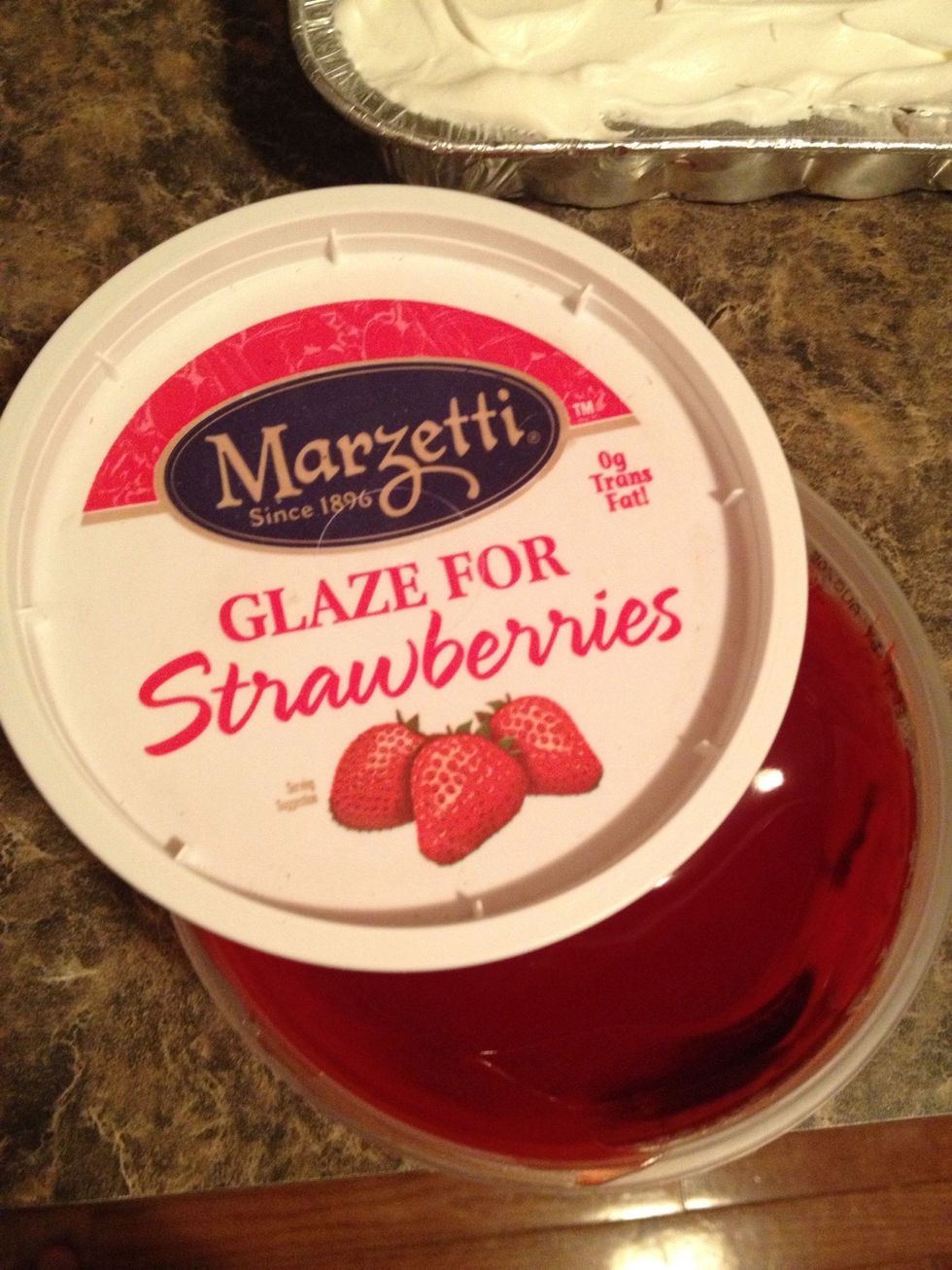 Add your strawberry glaze to the strawberries.