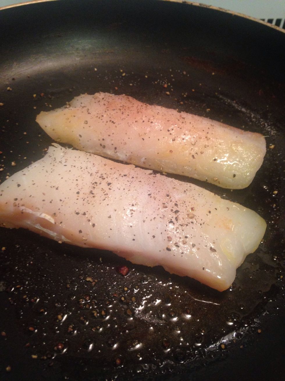 Add your two fillets to some hot olive oil spice to your liking- cook for 2-4 min per side