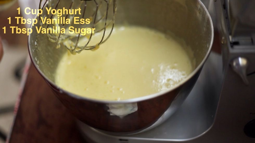 Add your vanilla sugar or vanilla essence. Or both. Also add 1 cup of yoghurt at this point and keep the machine spinning on a fairly high spin