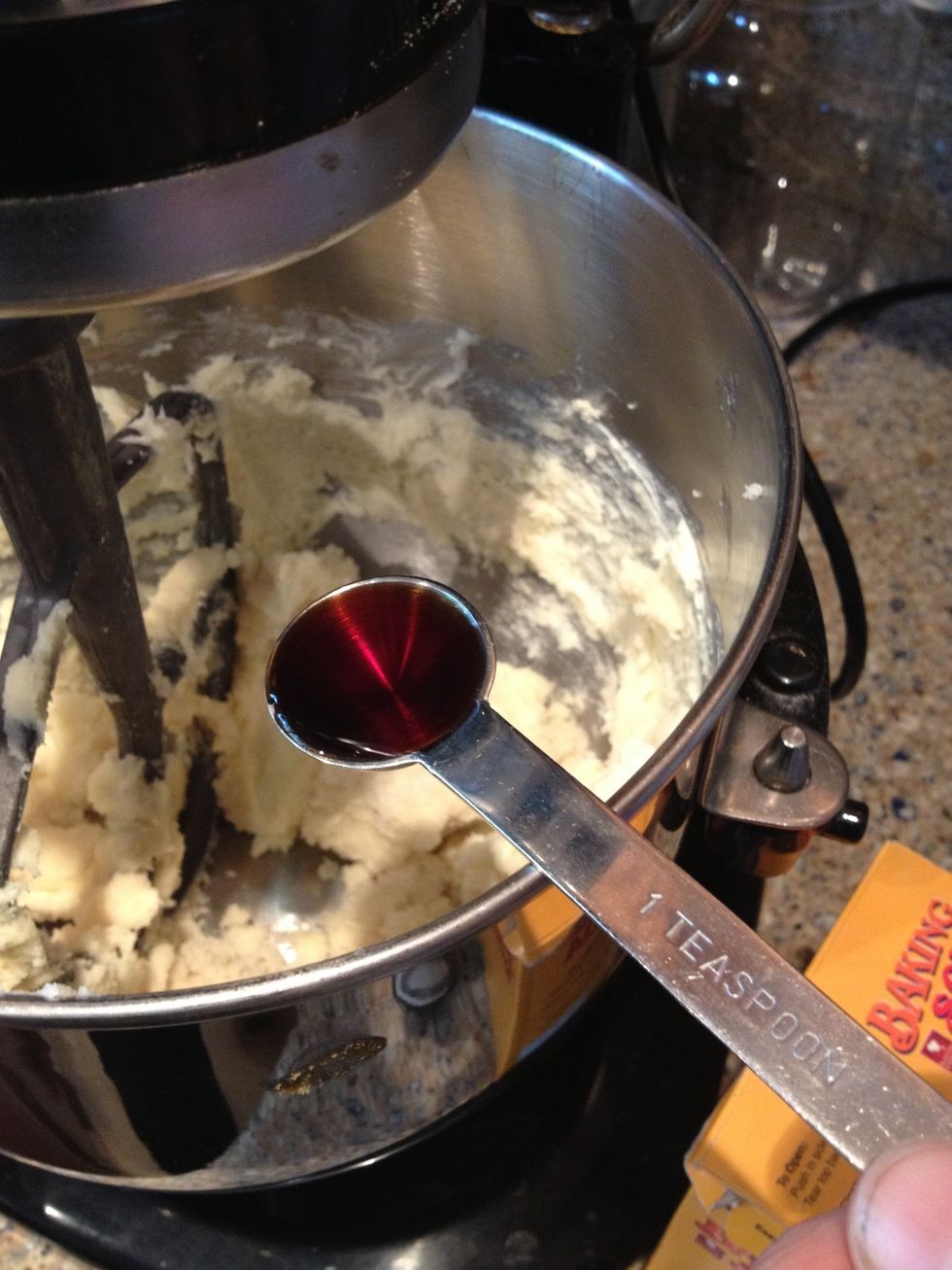 Add your vanilla to the creamed butter and sugars. Then, mix it in ;)