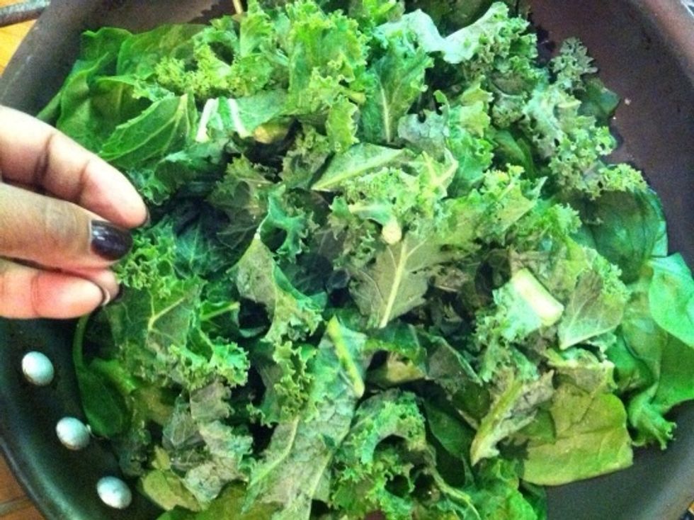 Add your veggies when the skillet is good and hot. I filled the pan with fresh spinach and kale.