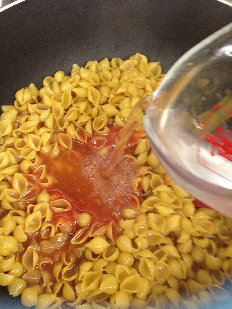 Add your water and eyeball it, making sure the water covers up to an inch over your noodles.