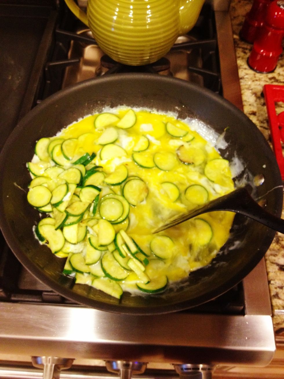 Add your whole eggs and egg whites then scramble