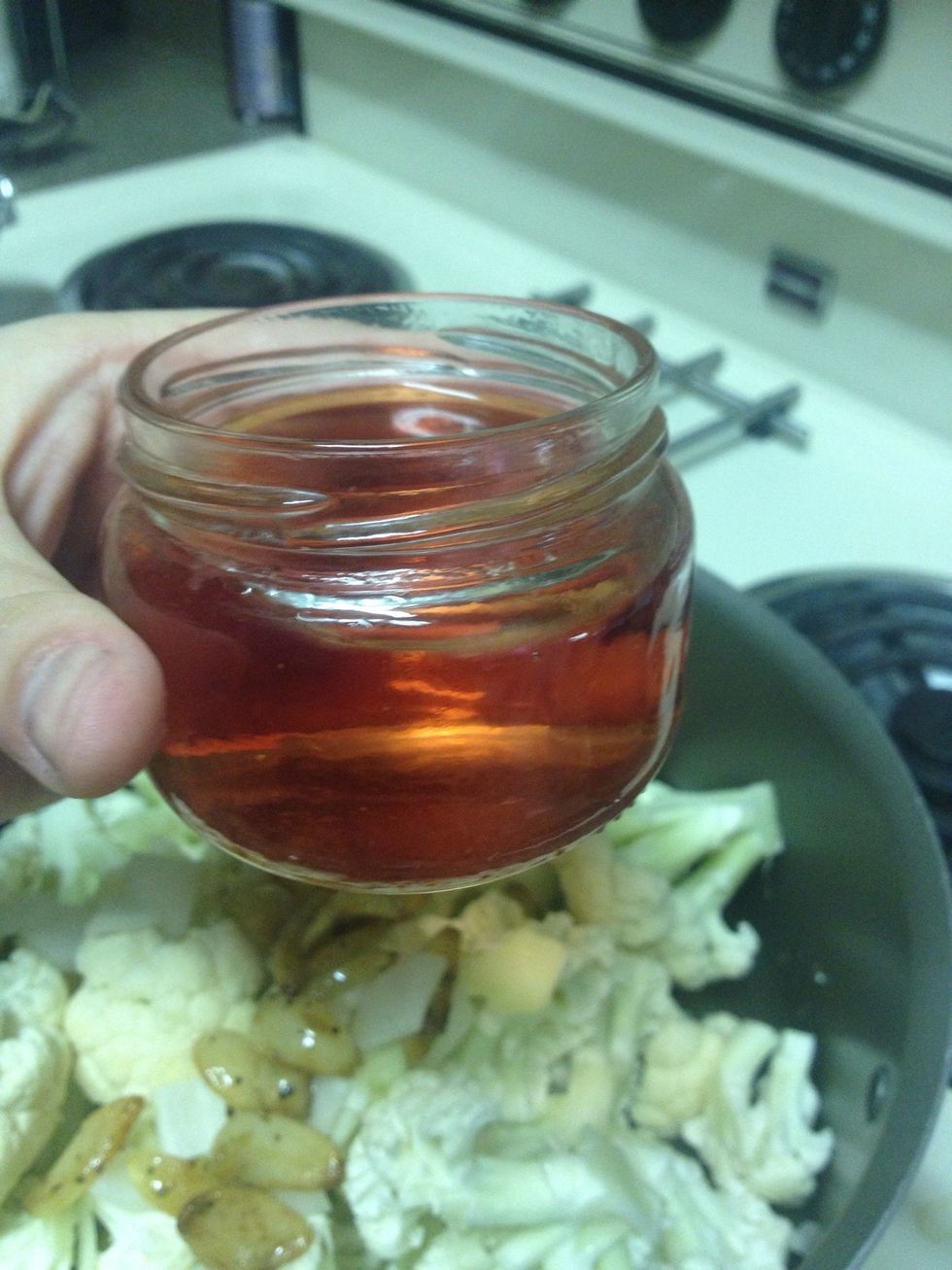 Add your wine. I'm using a pink wine but you can really use any kind.