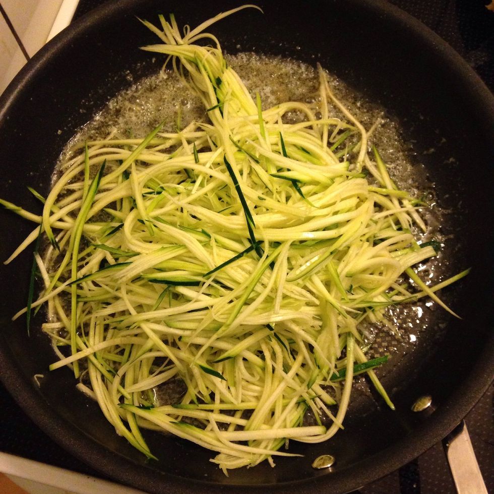 Add zuccini/squash. Stir with a pair of food tweezers