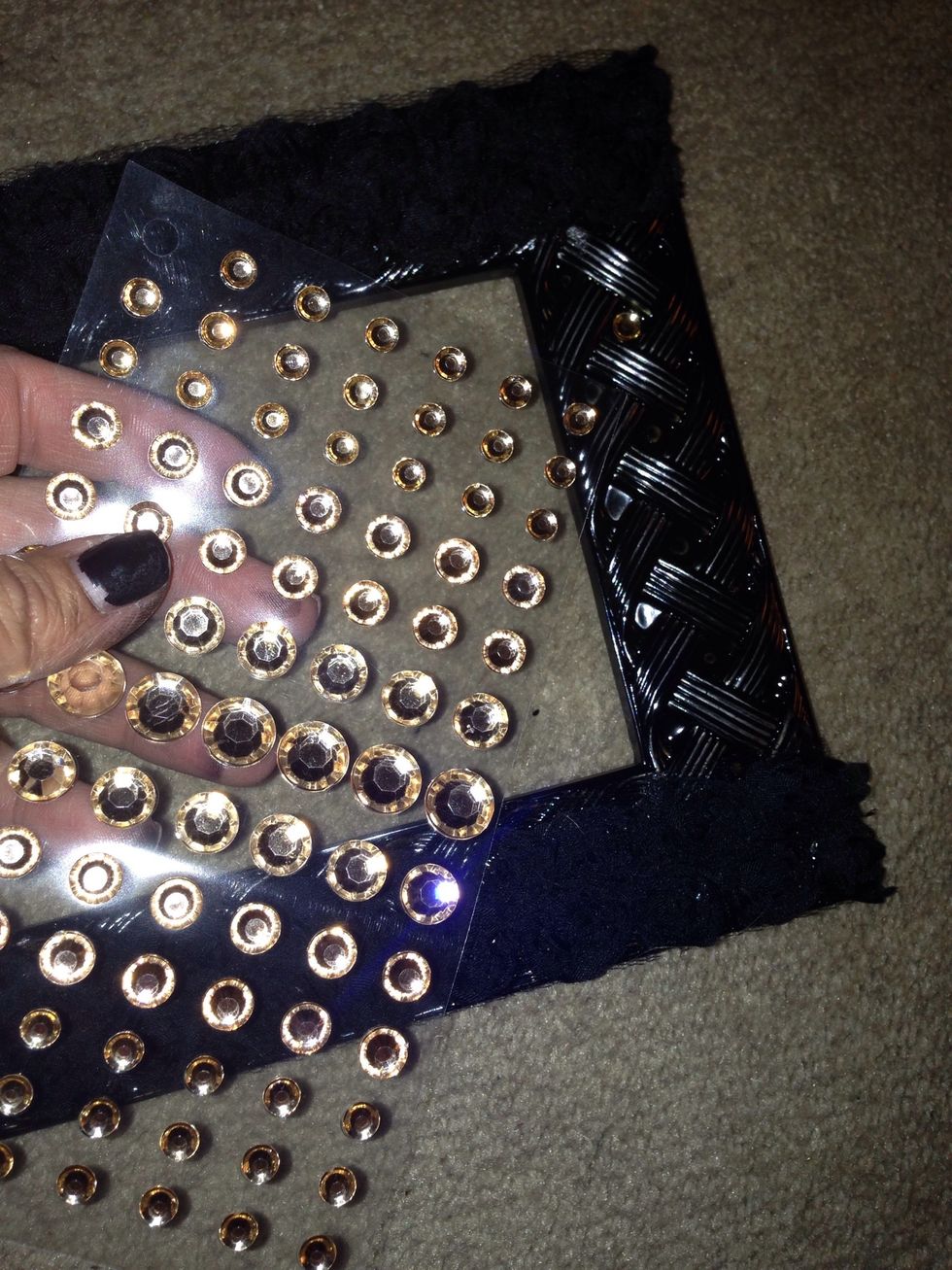 Added blush rhinestones to either side of frame