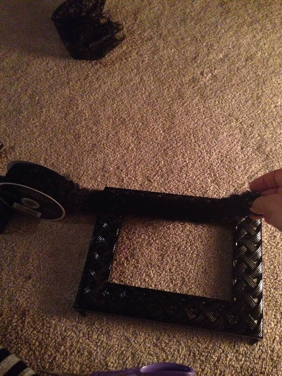 Added decorative ribbon to the top and bottom of picture frame