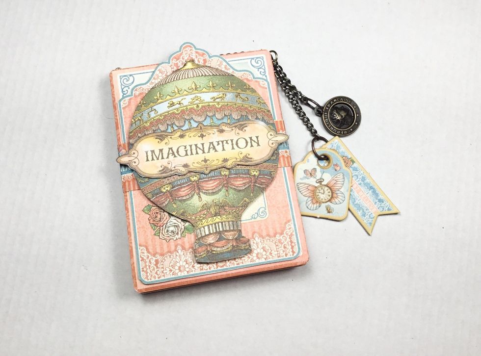 Added some chains and chipboard to trim.