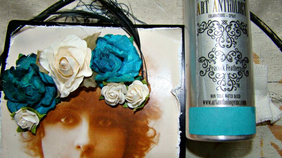 Added some flowers to my ladies hair and sprayed some with Peacock Feathers Colorations Spray.