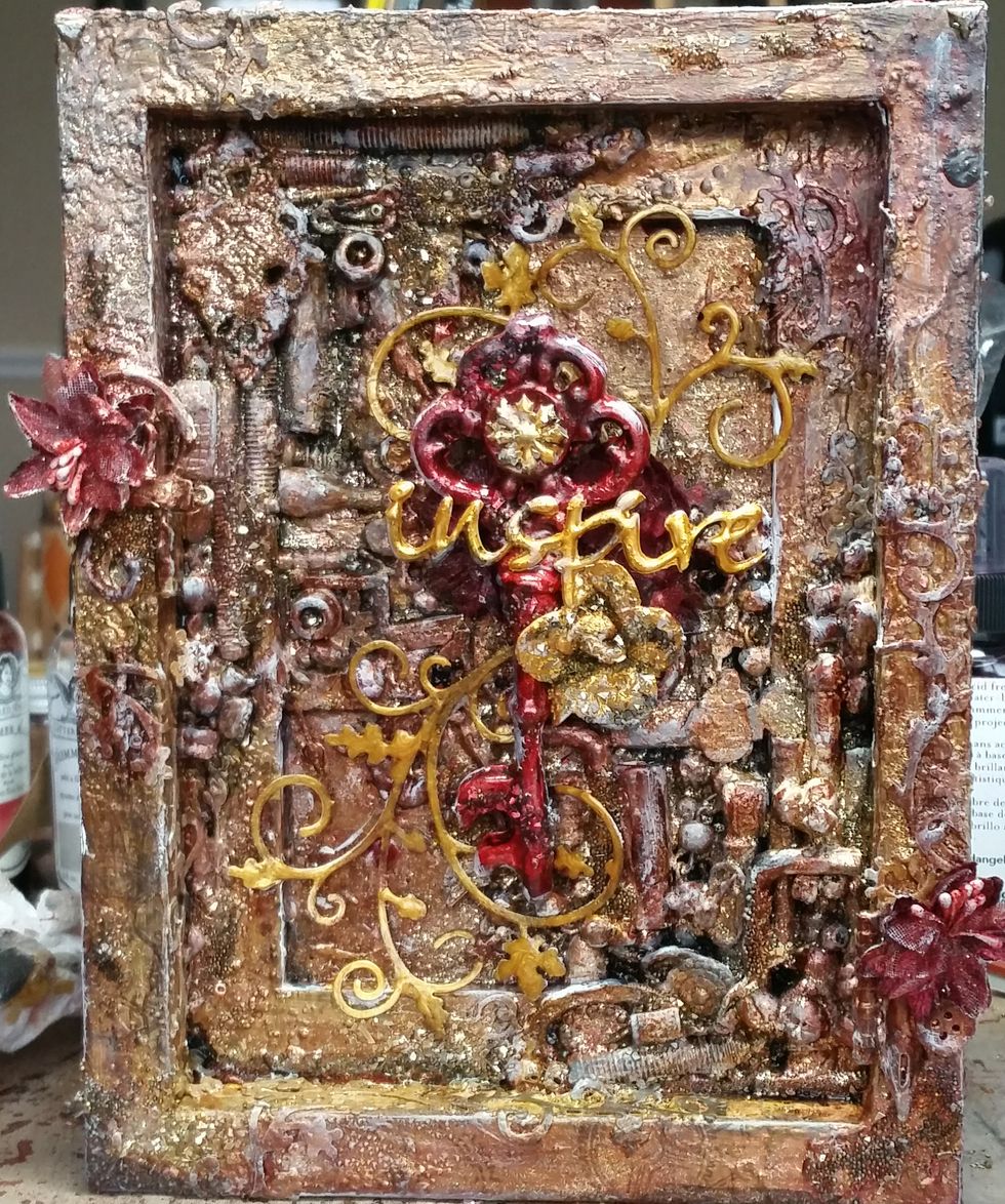 Added some more TA Iron mist to the gold flower to create depth and to other places around the piece.