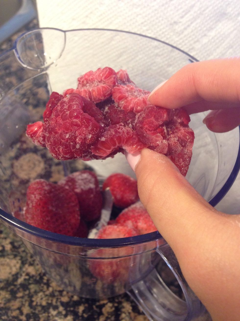 Adding a chunk of raspberries.