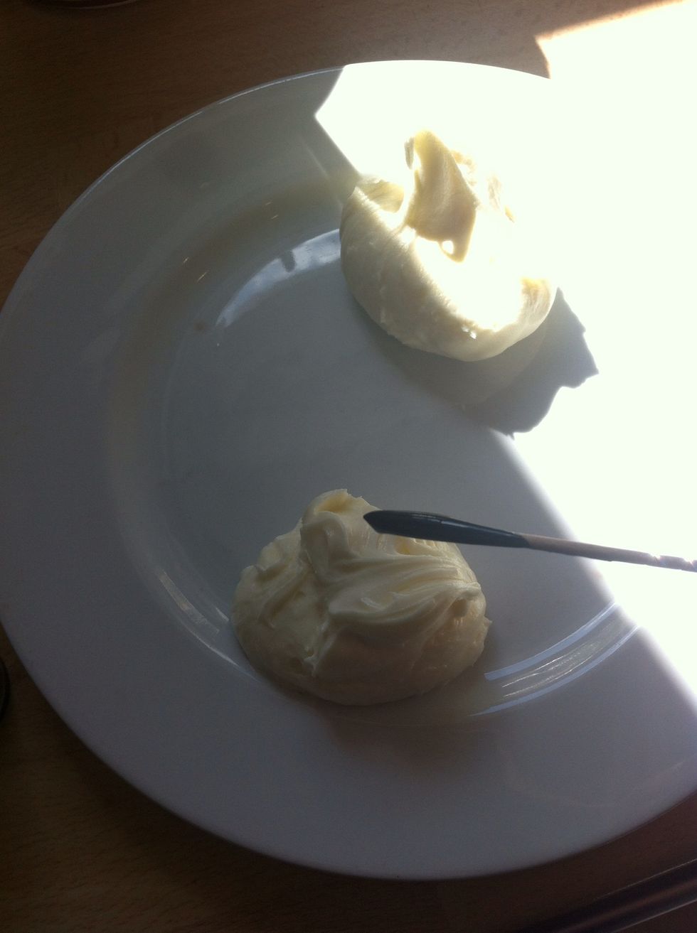 Adding food colouring to some icing.