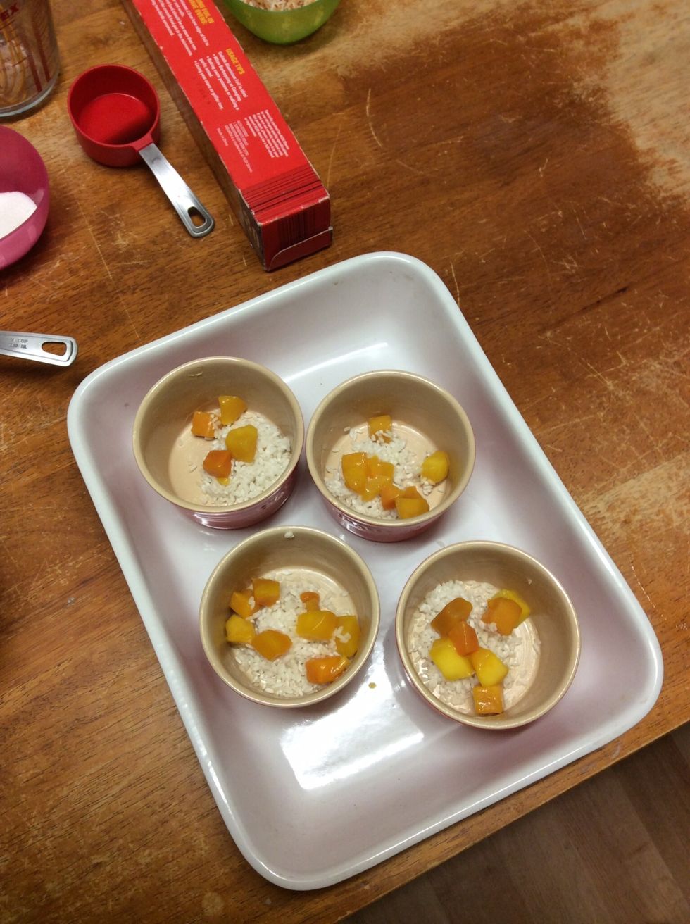 Adding mango to the rice