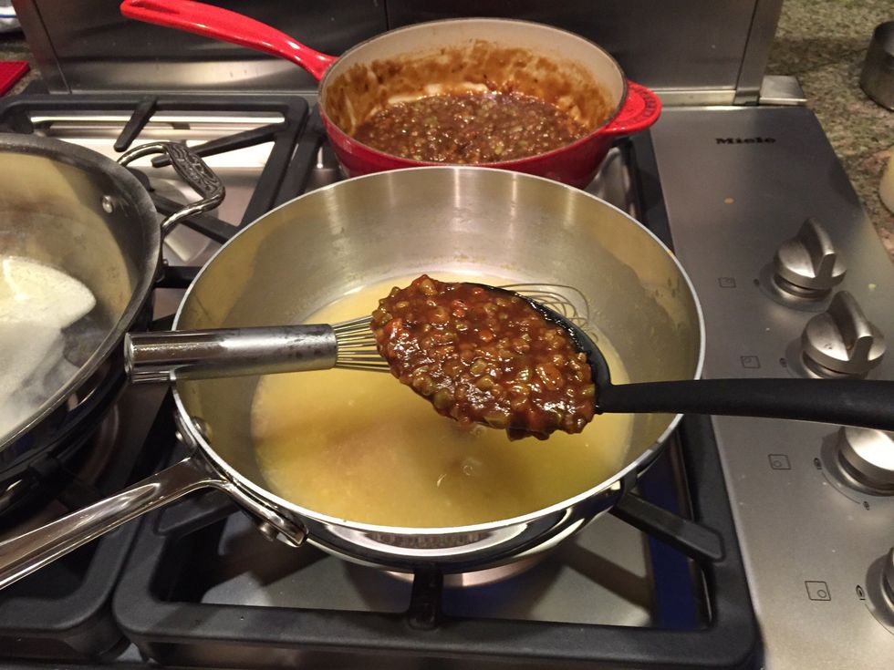 Adding roux to the 2 c. chicken stock/broth, whisking in gradually