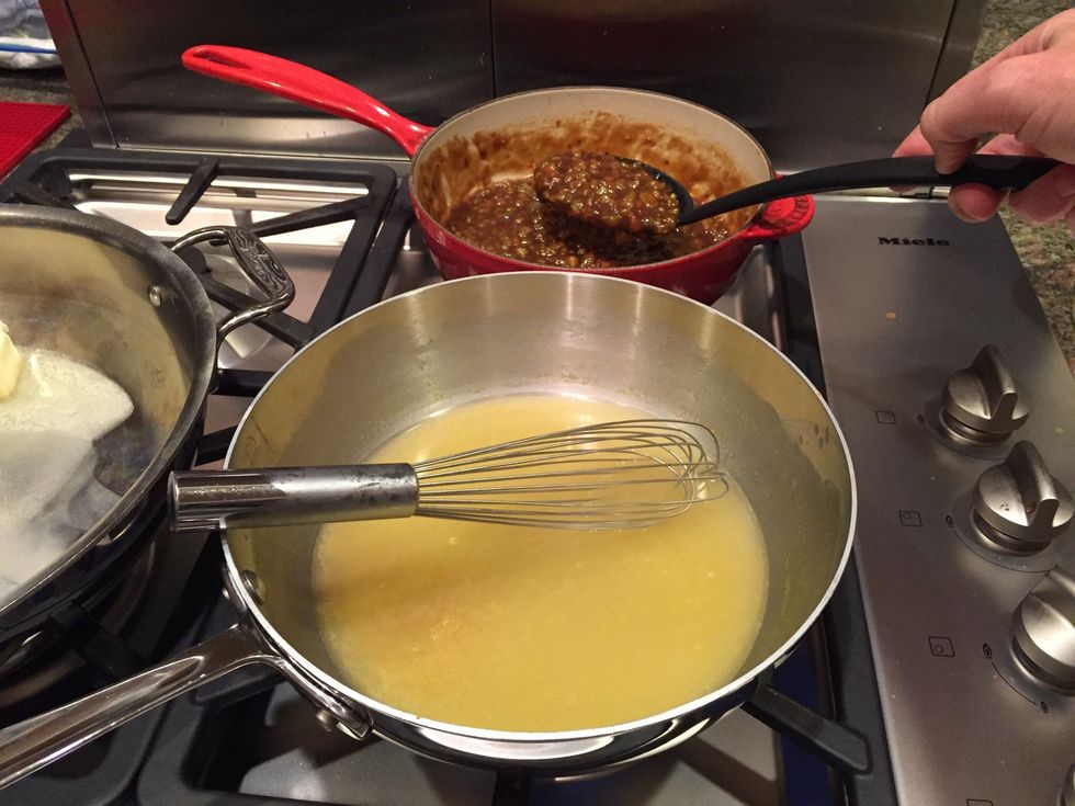 Adding roux to the 2 c. chicken stock/broth