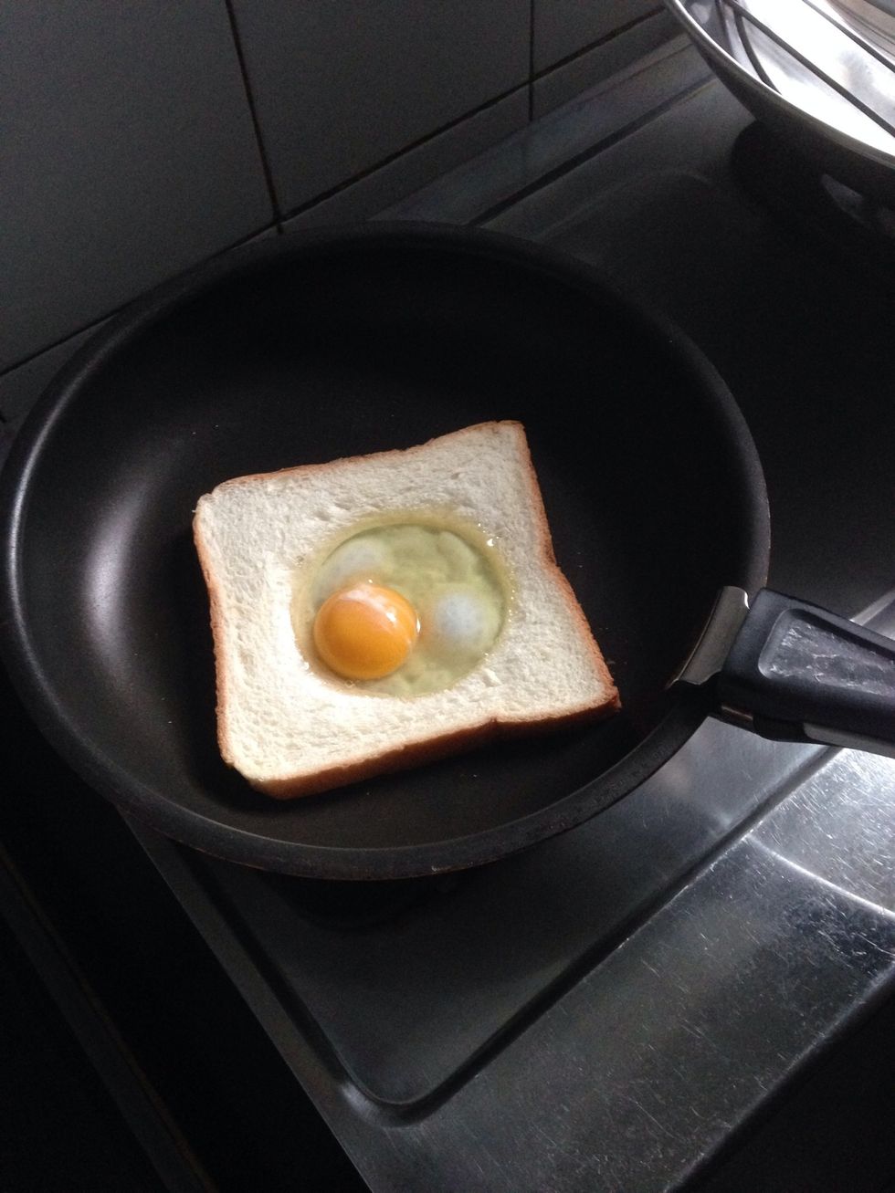 Adding some oil so that the egg won't stick on the pan!