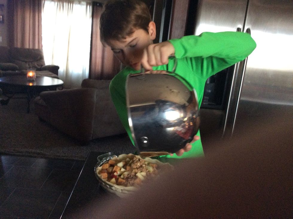 Adding the topping of the pie.