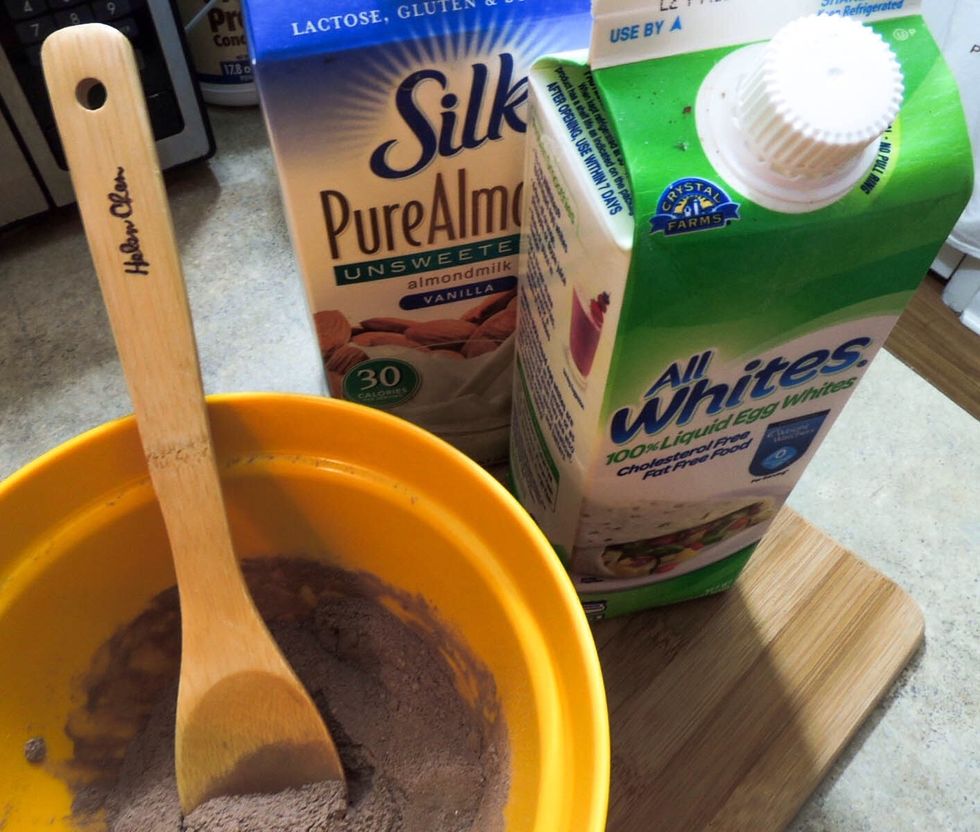 Adding wet ingredients, almond milk and egg whites (any non-dairy milk would work, or even water)