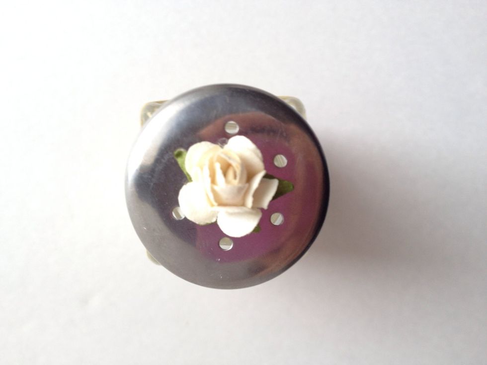 Adhere a little rose on top. Feel free to add glitter or Glimmer Mist!