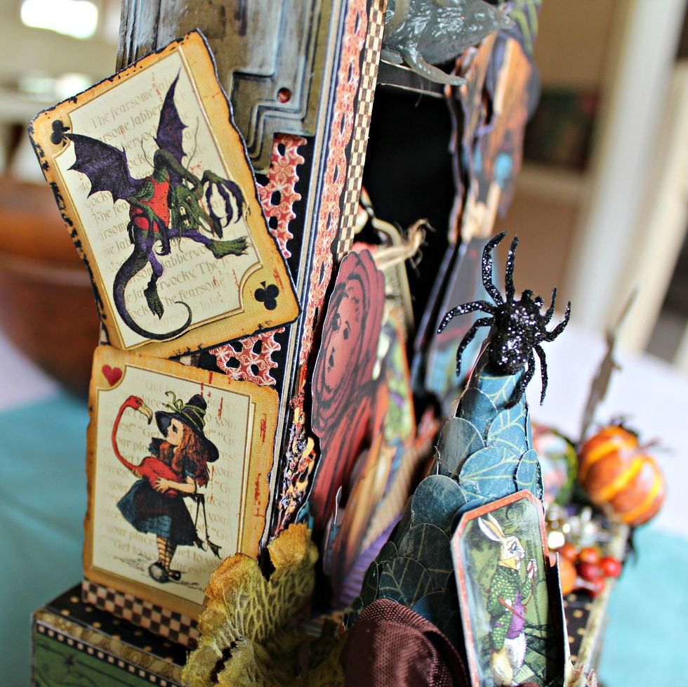 Adhere cards that have been layered together with pop dots to the side