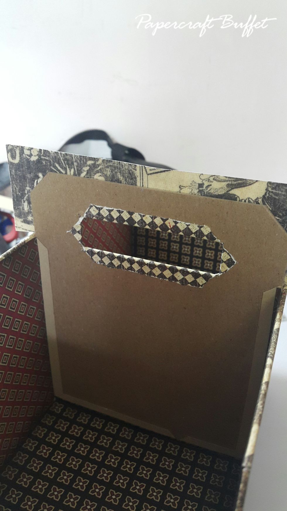 Adhere, cut a hole to fold inside the handle