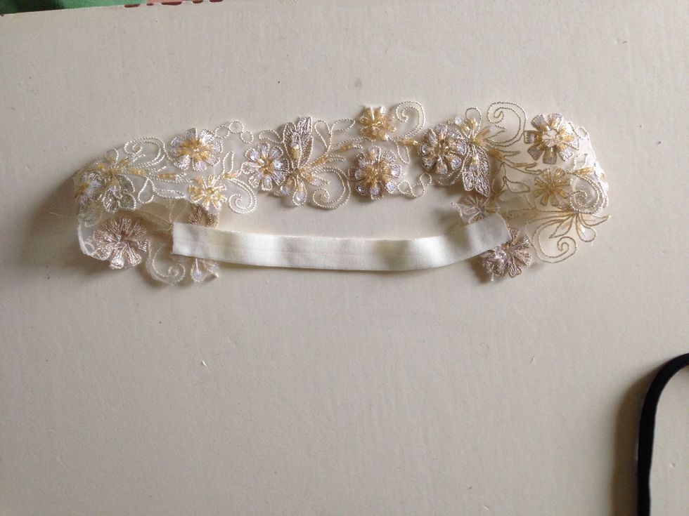 Adhere each side to the ribbon.