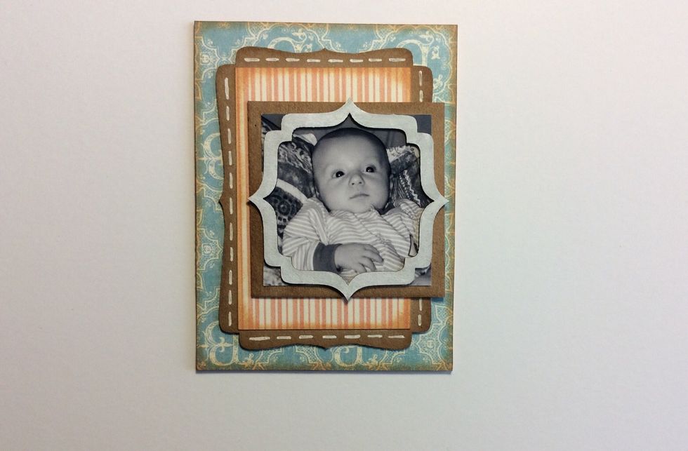 Adhere frame to photo unit and then adhere to the ATC base piece. off to one side as pictured.
