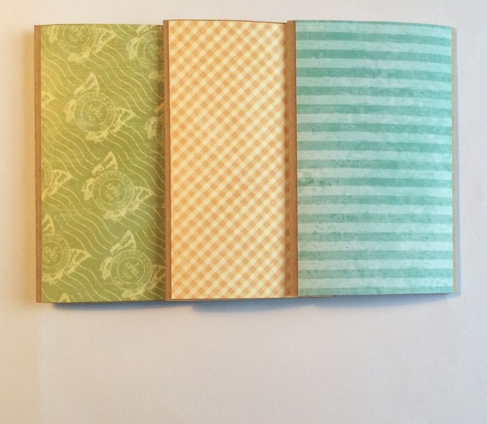 Adhere mats to each side of the cardboard tubes. The edges will not be covered.