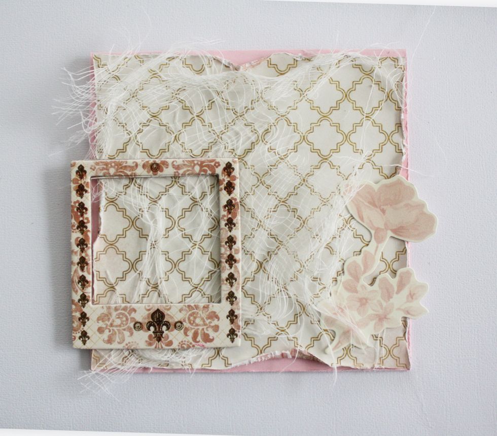 Adhere more cheesecloth, the BoBunny frame and a die cut. Have the die cut and frame just a bit off the side of the card for more interest.