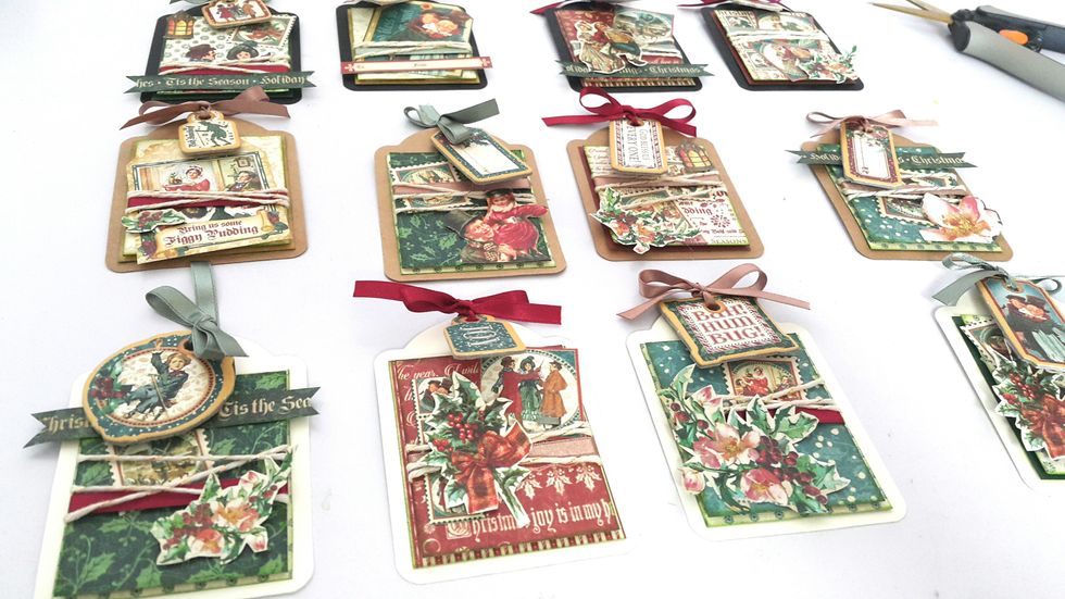 Adhere on the fussy cut-outs on the tags